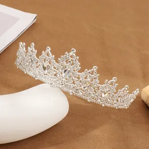 Elegant silver bridal crown with sparkling water drop crystals and rhinestones