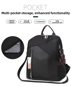 Close-up of functional side pocket on black nylon backpack showing phone storage