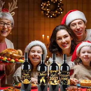 Detailed view of 2027 New Year wine labels on bottles during a festive family dinner