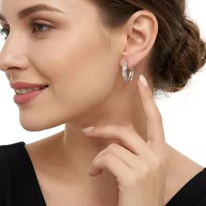 Elegant S925 sterling silver hoop earrings accented with sparkling moissanite stones