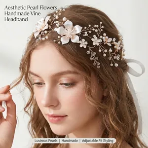 Elegant handmade bridal hair accessory featuring pearl flowers and crystal vine design