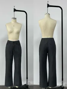 Detailed front and back view of high-waisted wide-leg jeans in dark grey denim fabric