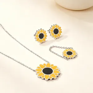 Detailed macro view of the vibrant enamel sunflower jewelry set crafted in stainless steel