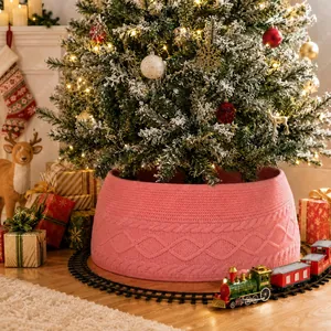 Pink cable knit Christmas tree collar with rhombus pattern and rustic holiday decor