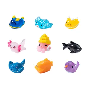 Colorful cartoon marine animal figurines set featuring dolphin, shark and octopus