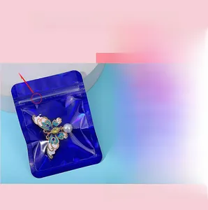 Close-up of holographic jewelry zip lock bag with transparent window and sturdy sealing strip