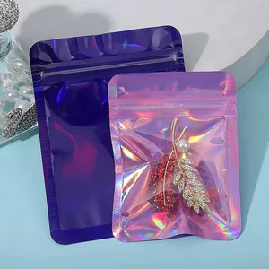 Macro shot of holographic laser resealable jewelry bags with pink finish for brooches
