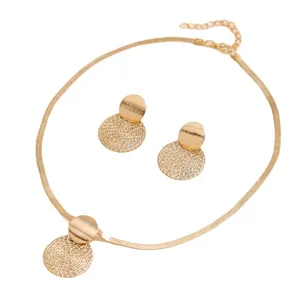 Elegant gold-tone geometric jewelry set featuring flat snake chain and textured pendants