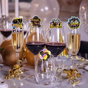 Close-up detail of festive 2027 New Year party wine glass decorative insert cards
