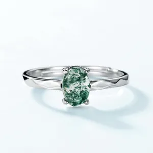 Elegant 925 sterling silver adjustable ring featuring a large oval green synthetic stone