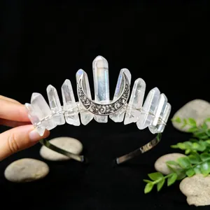 Close-up of handmade natural white crystal crown with silver crescent moon detail