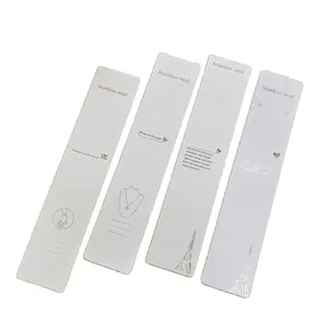 White jewelry display cards for long necklaces made of durable textured paper with slots