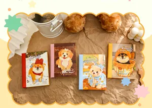 Four mini A7 notebooks featuring colorful dog illustrations with A Dog's Happy Days text