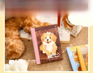 Detailed view of A7 notebook featuring a cute dog illustration and pink spine