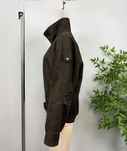 Detailed side profile of a loose dark brown suede bomber jacket with high collar design