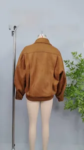 Detailed back view of a brown oversized suede bomber jacket displayed on a mannequin