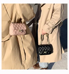 Quilted leather flap bag with gold ball chain strap in pink and black variants