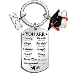 Detailed view of the 2026 graduation keychain featuring engraved inspirational Bible verses.