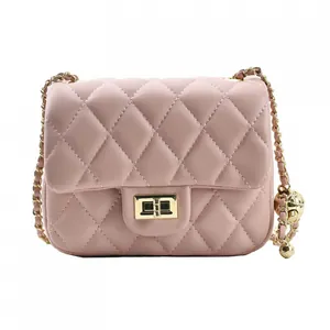 Pink quilted leather crossbody bag with golden chain strap and ball adjustment buckle