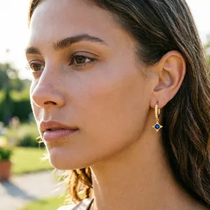 Elegant S925 sterling silver hoop earrings with a vintage blue zircon drop charm