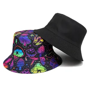 Vibrant rainbow mushroom print bucket hat paired with a solid black reversible sun hat