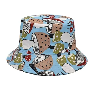 Detailed view of a blue bucket hat featuring colorful mushroom pattern for sun protection