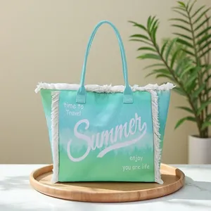 Gradient teal canvas tote bag with fringe edges and Summer time to Travel print