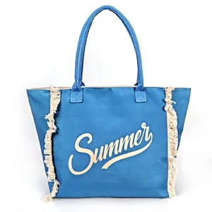 Blue canvas tote bag with Summer print and side fringe tassels for beach and daily use