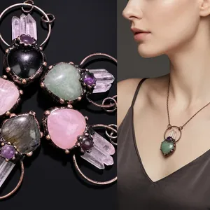 Detail of handmade natural crystal heart pendants with vintage bronze metal wrap