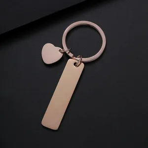 Polished rose gold stainless steel keychain with heart and long bar pendant