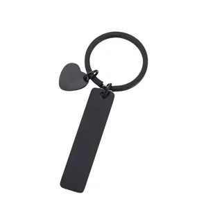 Minimalist black stainless steel keychain with heart charm and blank tag for engraving