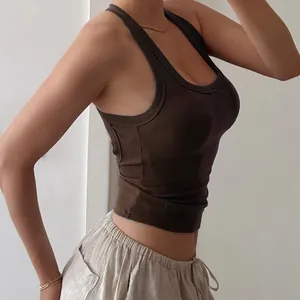 Close-up of chocolate brown ribbed fabric texture on slim fit U-neck crop top