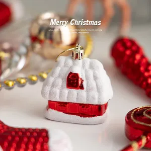 Red and white Christmas house ornament with snow texture and gold string for tree decor