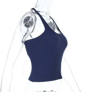 Detail showing high-stretch ribbed knit texture and slim-fit cut of the navy tank top