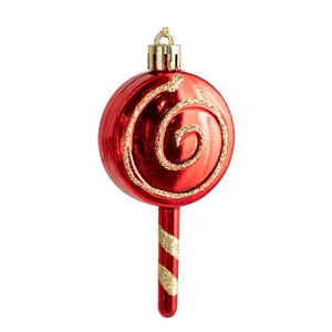 Glossy red lollipop Christmas tree ornament with golden glitter spirals and hanging loop
