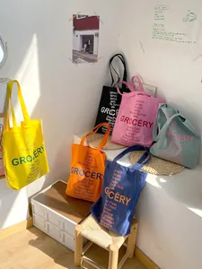 Retro canvas grocery tote bags in assorted colors with large capacity and letter print