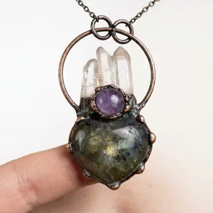 Antique bronze heart labradorite pendant with raw white crystal pillars and amethyst
