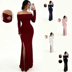 Detail of the high-slit hem and back cutout design on this elegant long sleeve gown