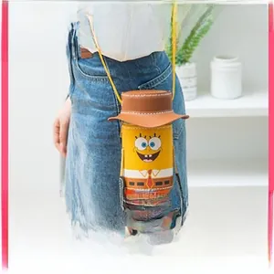 Detail of DIY SpongeBob style coin purse kit showing stitching holes and shoulder strap