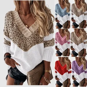 Detail view of V-neck leopard patchwork knit sweater showing multiple color options