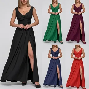 Detail of elegant V-neck maxi dress showing side slit in multiple stylish colors
