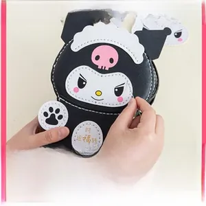 DIY handmade Kuromi style black mini coin purse sewing kit with gold calligraphy text