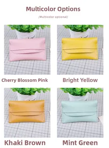 DIY handmade mini coin purses in pink, yellow, brown, and green with white stitching