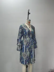 Detailed view of the V-neckline and paisley pattern on this stylish women's dress