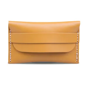 Handmade yellow leather card holder with contrast stitching in a minimalist design