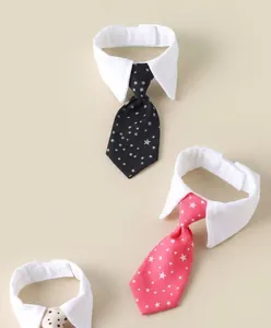 Detail of dog tuxedo collars with neckties in black star and red star patterns