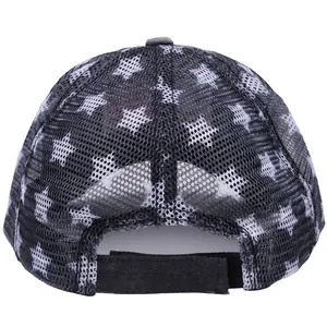 Rear view of black mesh trucker hat featuring white star prints and Velcro strap