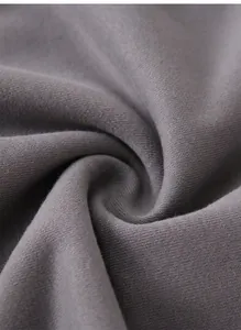 Dettaglio macro del tessuto spugna francese in puro cotone pesante di alta qualità grigio