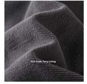 Vue macro d'un sweat-shirt lourd avec texture de doublure en French Terry