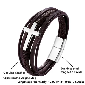 Detail of multi-layer leather bracelet with silver cross and stainless steel magnetic clasp